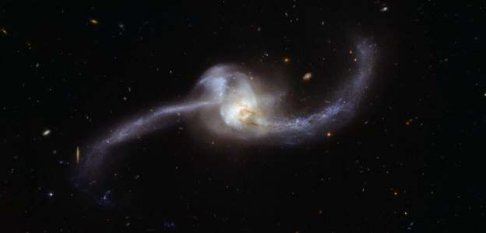 2 galaxies merge to become NGC2623 in constellation Cancer.jpg
